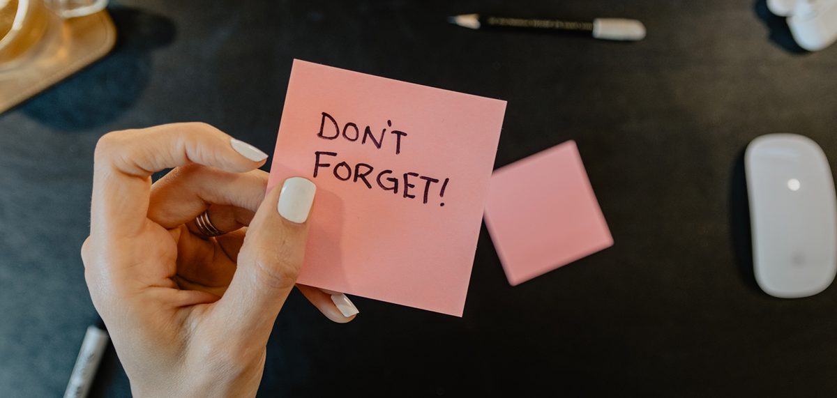 A sticky note that reads Don't Forget
