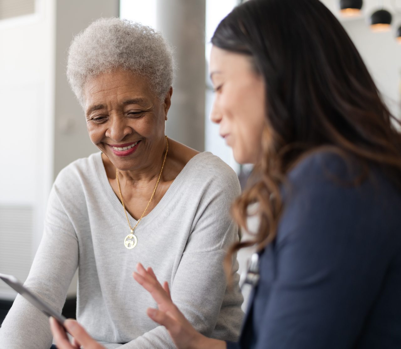 Older adult completing a cognitive assessment with a provider